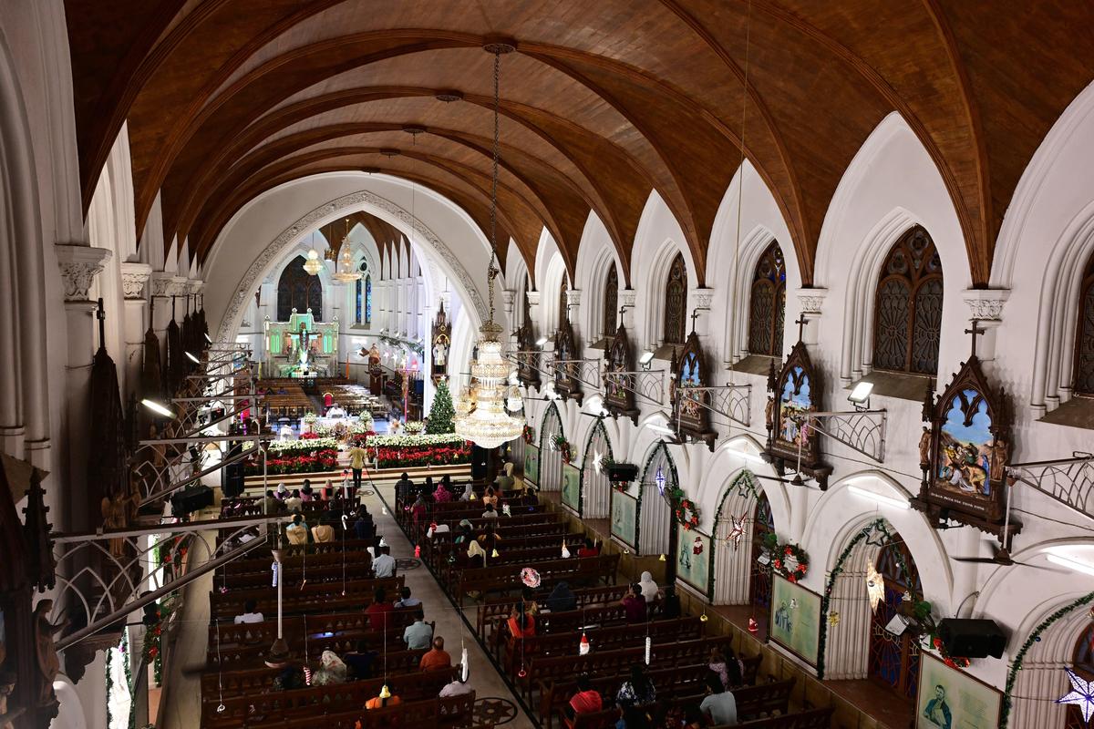 Christians offering special prayer in the eve of Christmas Celebrations at St Thomas basilica in Santhome on Friday Photo