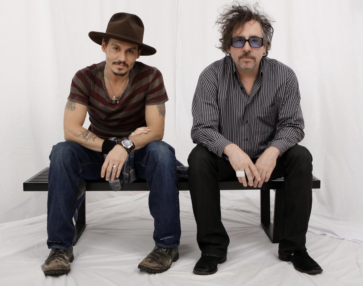 Actor Johnny Depp, left, and director Tim Burton pose for a photograph in West Hollywood, Calif., Wednesday, Dec. 5, 2007.