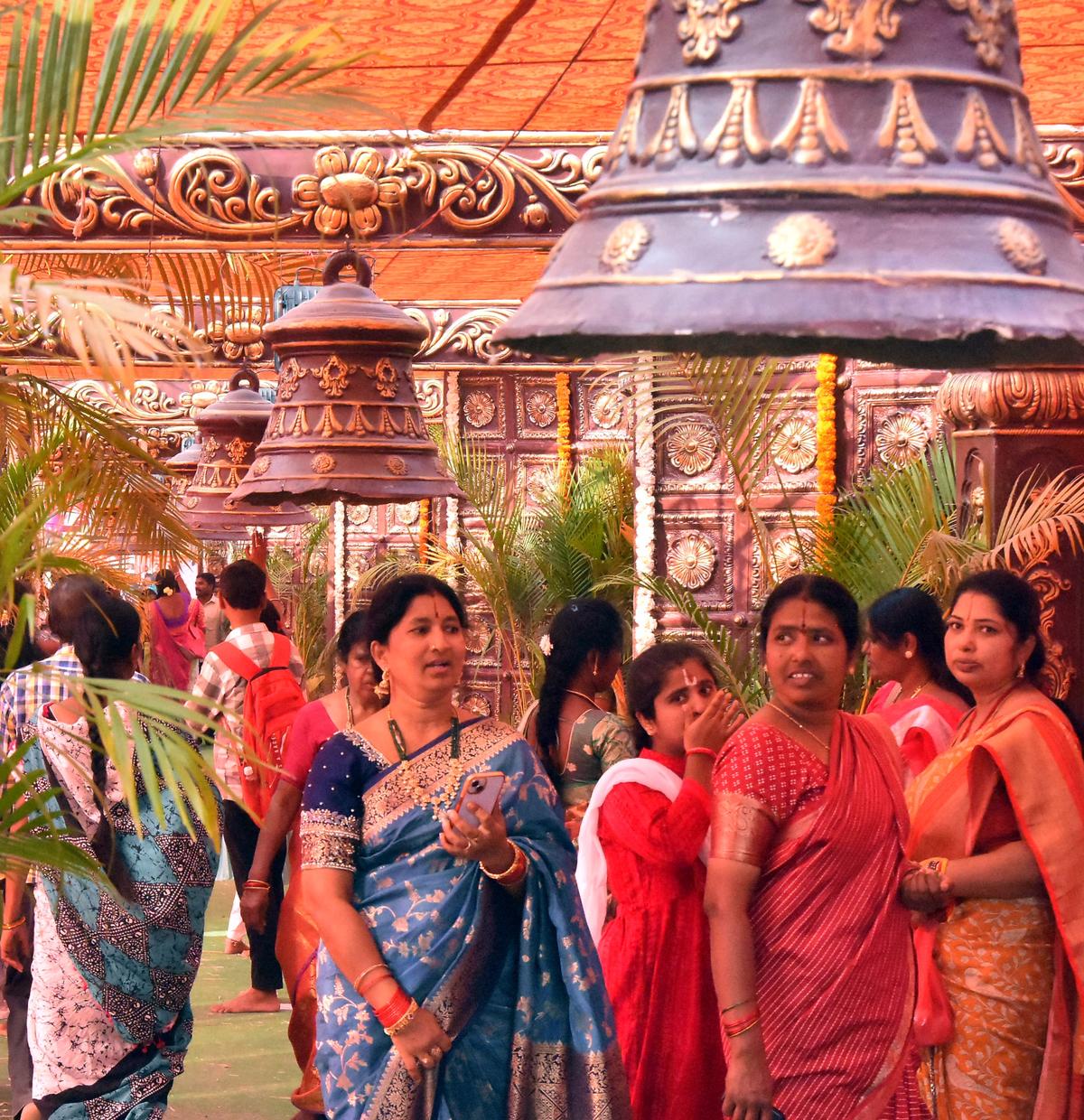 Devotees visit Sri Mahalaxmi Godha Sametha Virat Venkateshwara Swami Temple Vaikuntapuram on the occasion of Vaikuntha Ekadashi in Sangareddy on Friday.