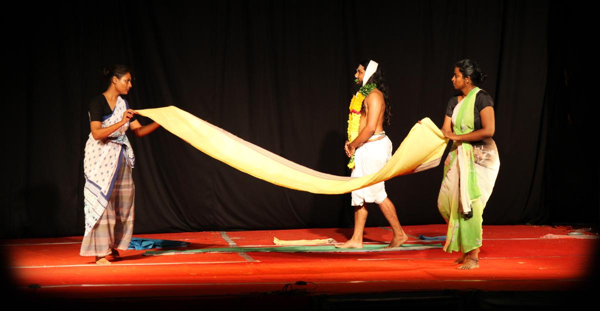 A scene from the play Nada Paavaadai.