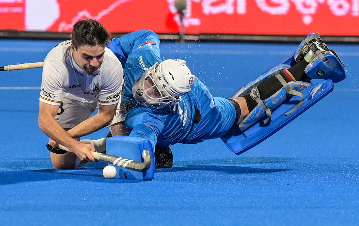 Germany’s goalkeeper Jean-Paul Danneberg thwarts Belgium’s Martin Zwicker during the penalty shootout at the FIH men’s Hockey World Cup 2023 final at the Kalinga Stadium in Bhubaneswar, Friday, January 29, 2023. 