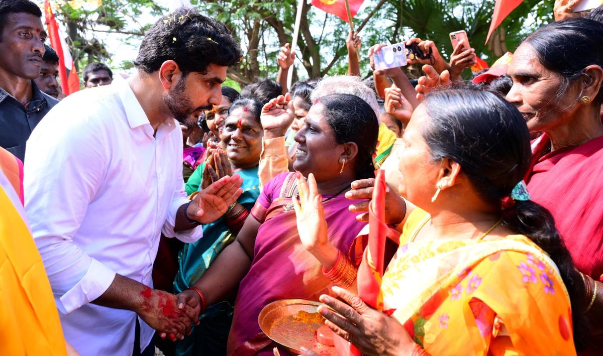 Nara Lokesh interacts with locals during Yuvagalam padayatra in Tuni Assembly constituency in Kakinada district on Saturday. 