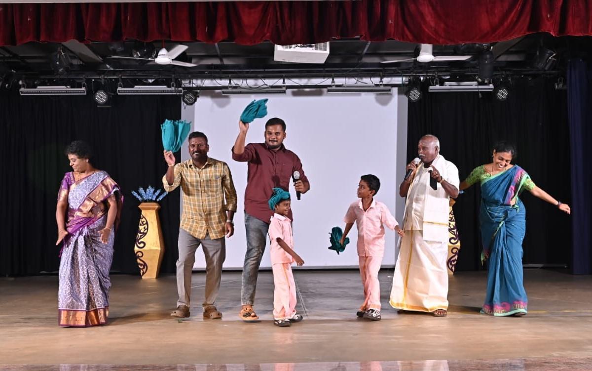 Parents and grandparents participate in the family bonding day celebration at Lakshmi school, Madurai.
