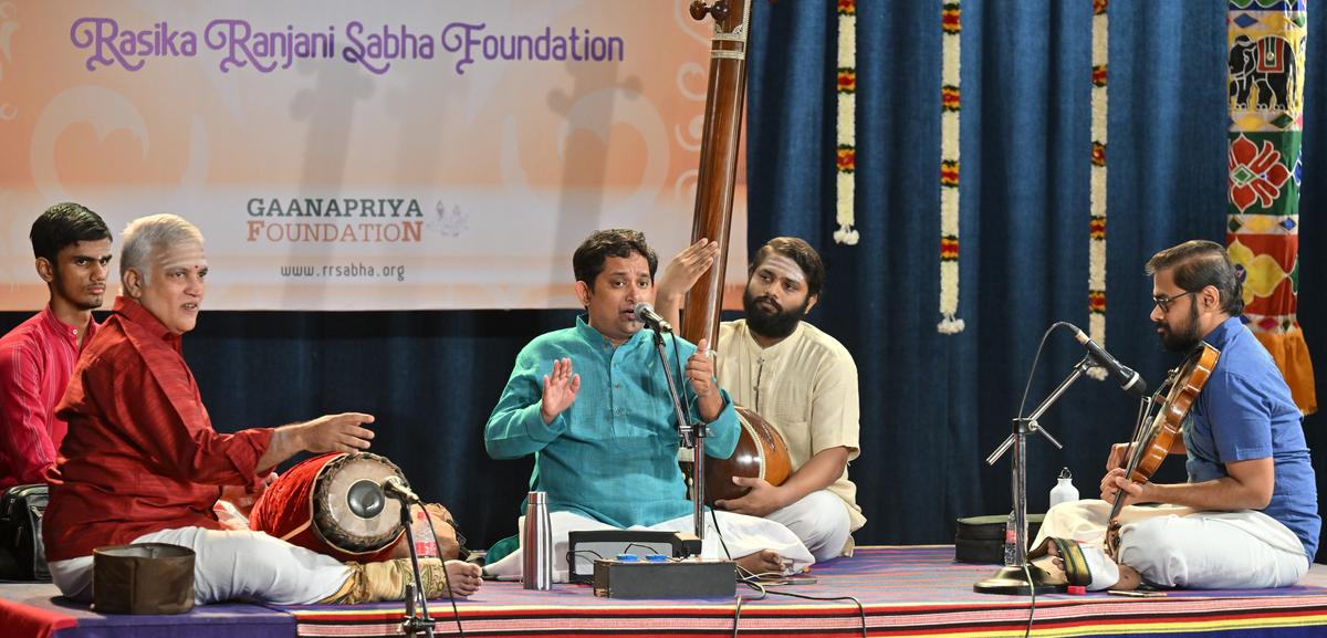 Prasanna Venkatraman with poongulam subramaniam (mridangam), and M. Vijay (violin). 
