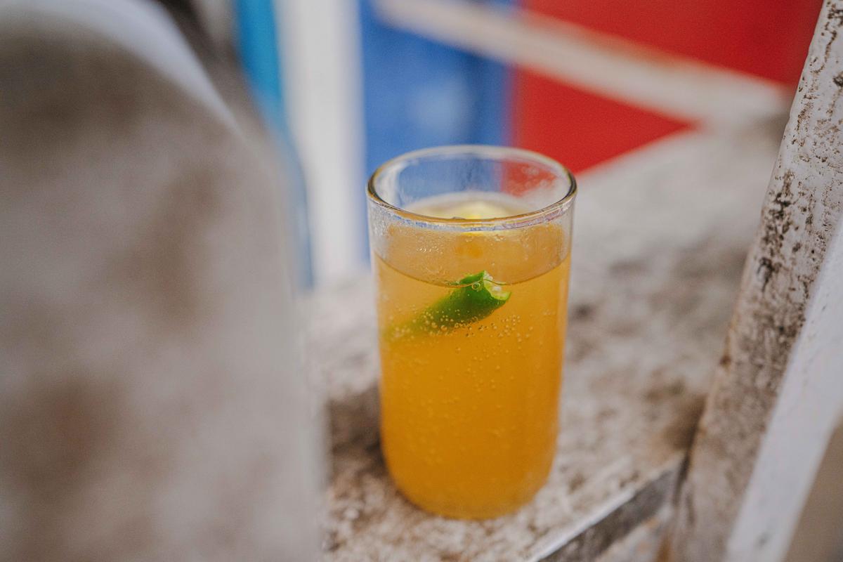 Feni being served Feni being served
