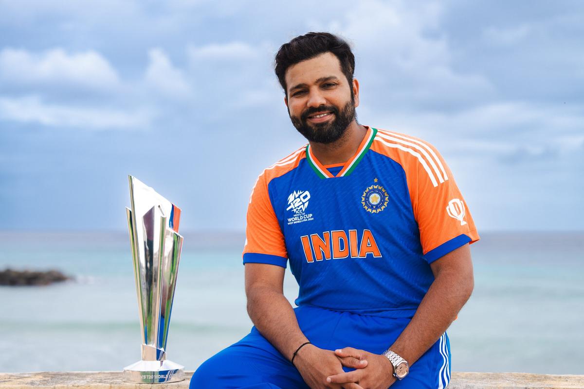 India captain Rohit Sharma poses with the 2024 ICC Men’s T20 World Cup trophy. 