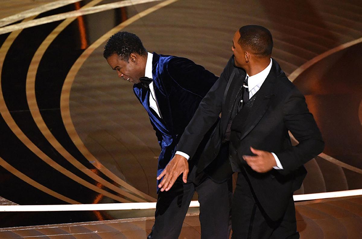 Will Smith slaps Chris Rock onstage during the 94th Oscars at the Dolby Theatre in Hollywood, California on March 27, 2022