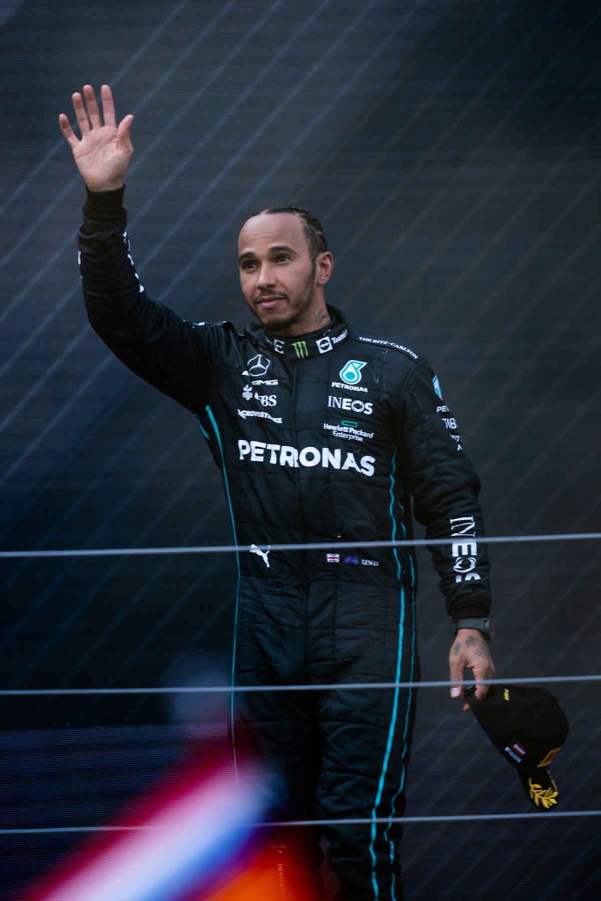 Lewis Hamilton on the podium after winning third place at the Austrian Grand Prix.