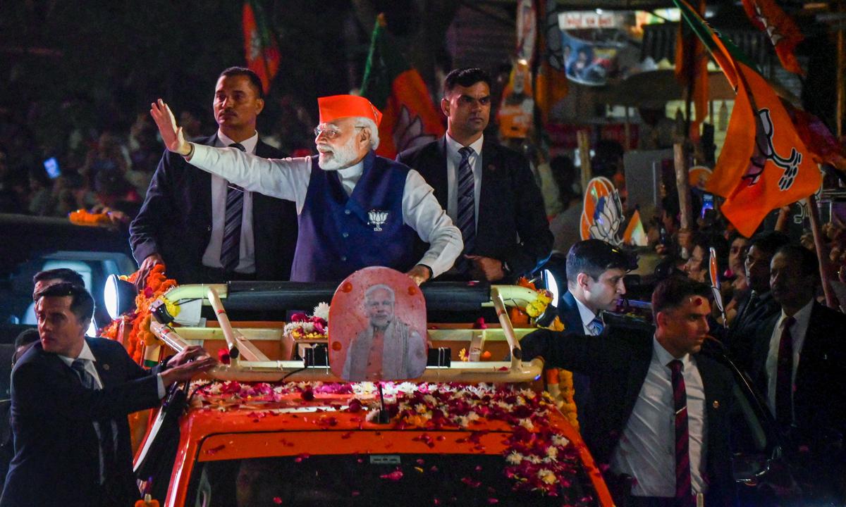 Gujarat Assembly polls | Modi covers Ahmedabad in a mega roadshow, attacks Congress for ‘Ravan’ jibe