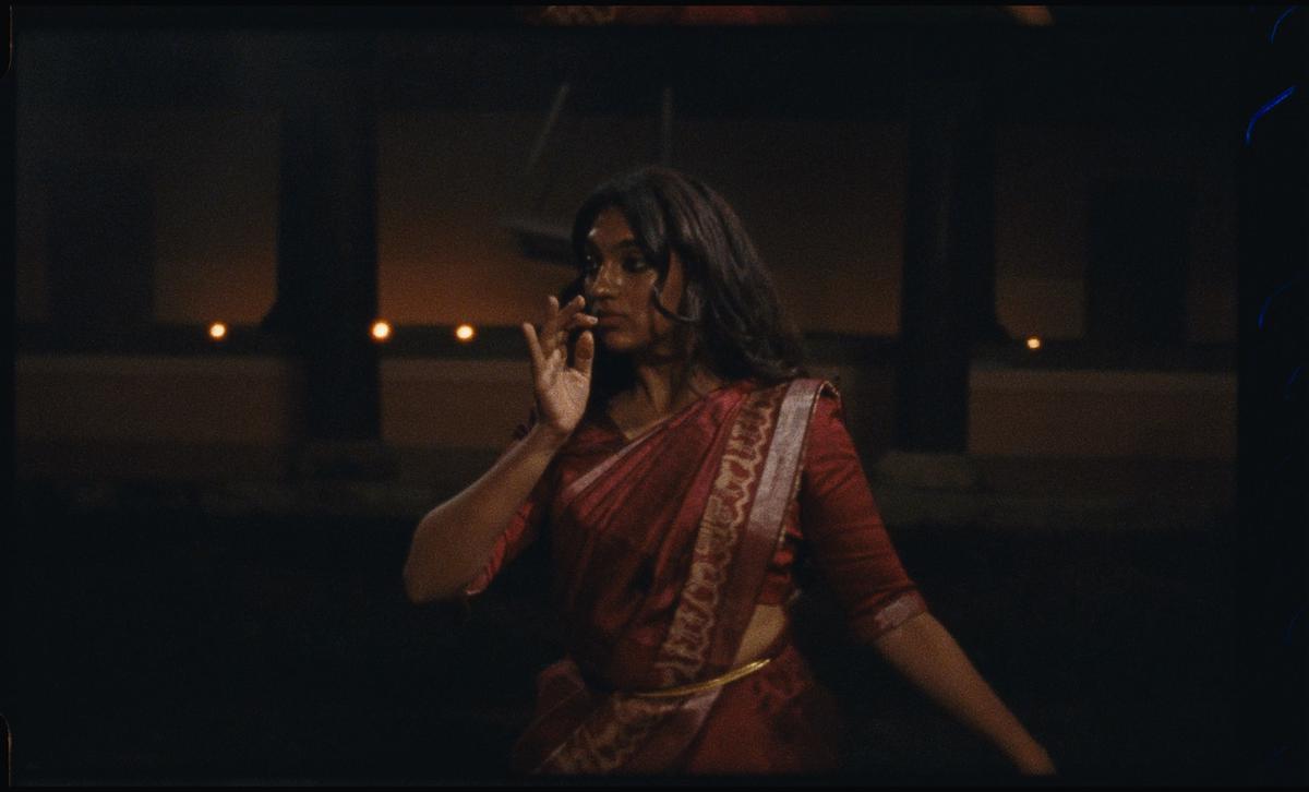 Still from the music video 'Kalliyankatt Neeli' by Thaikkudam Bridge