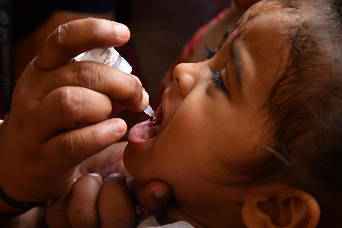 Polio vaccine being administered to a child.