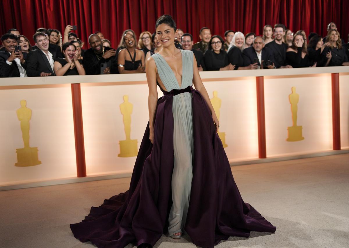 Monica Barbaro arrives at the Oscars on Sunday, March 12, 2023, at the Dolby Theatre in Los Angeles
