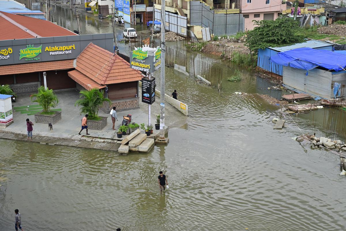 Flooded Kogilu Cross after heavy overnight rains in Bengaluru on October 22.