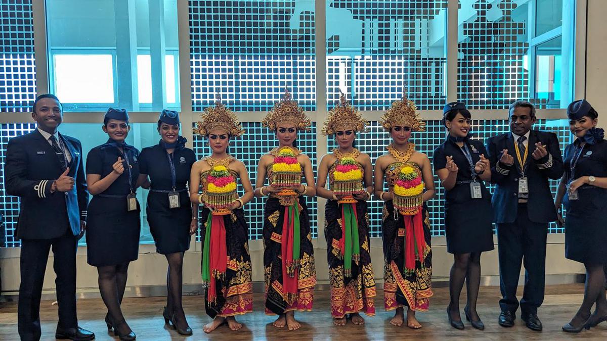 IndiGo staff mark the commencement of daily direct flights between Bengaluru and Denpasar in Bali, Indonesia on March 29, 2024. 