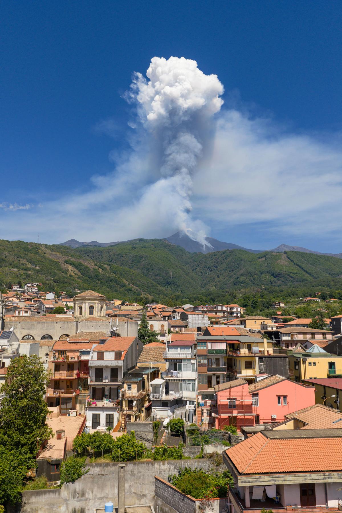 Smoke billows from Mount Etna volcano, seen from the village of Zafferana Etnea, Italy, on June 2, 2025. 