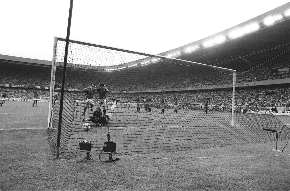 Spanish goalkeeper Luis Arconada dives in vain to try to stop the ball as it rolls behind the goal line following the free kick from France captain Michel Platini during the final of the Euro 1984 soccer championship in Paris on June 27, 1984.