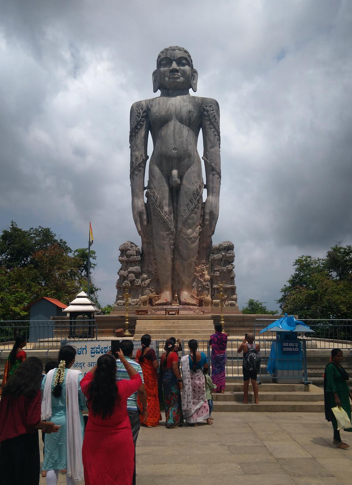 Devotees at the Bahubali statue in Dharmastala. There has been an increase in the number of women tourists after the introduction of the Shakti scheme in Karnataka. 