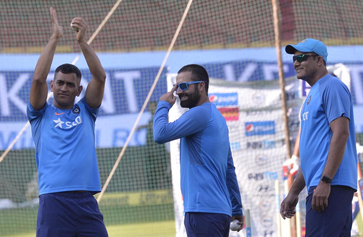 File picture of Rasool, centre, with former India captain M.S. Dhoni and former national coach Anil Kumble in 2017 File picture of Rasool, centre, with former India captain M.S. Dhoni and former national coach Anil Kumble in 2017