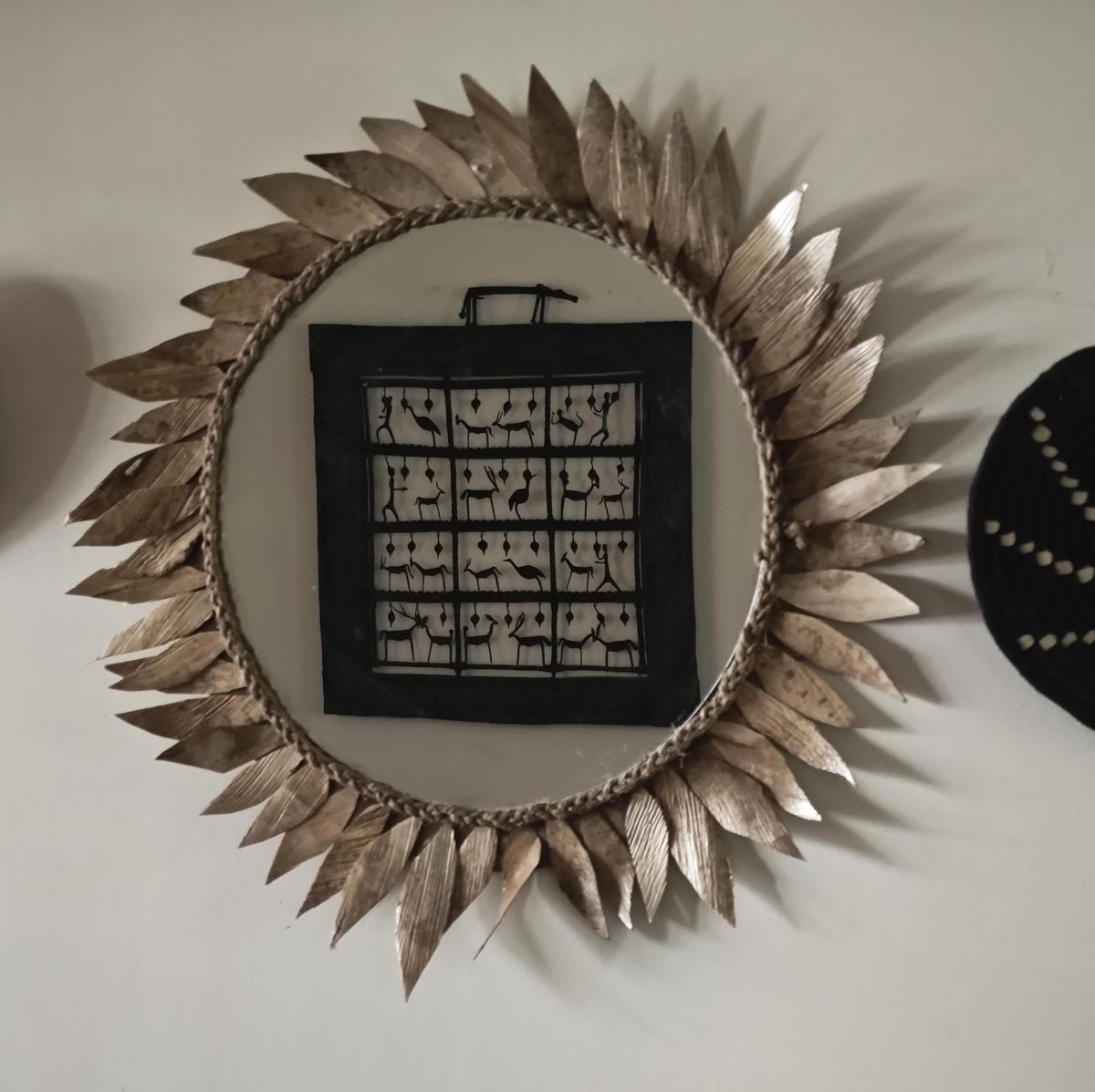 A mirror fashioned by Sudha Mahalingam