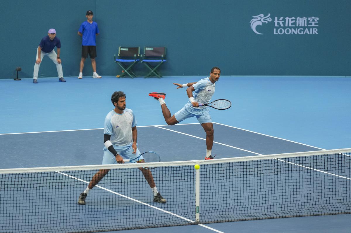 Saketh Myneni and Ramkumar Ramanathan in action during their men’s tennis doubles semifinal against Seongchan Hong and Soonwoo Kwon at the 19th Asian Games, in Hangzhou, China, Thursday, Sept. 28, 2023. 