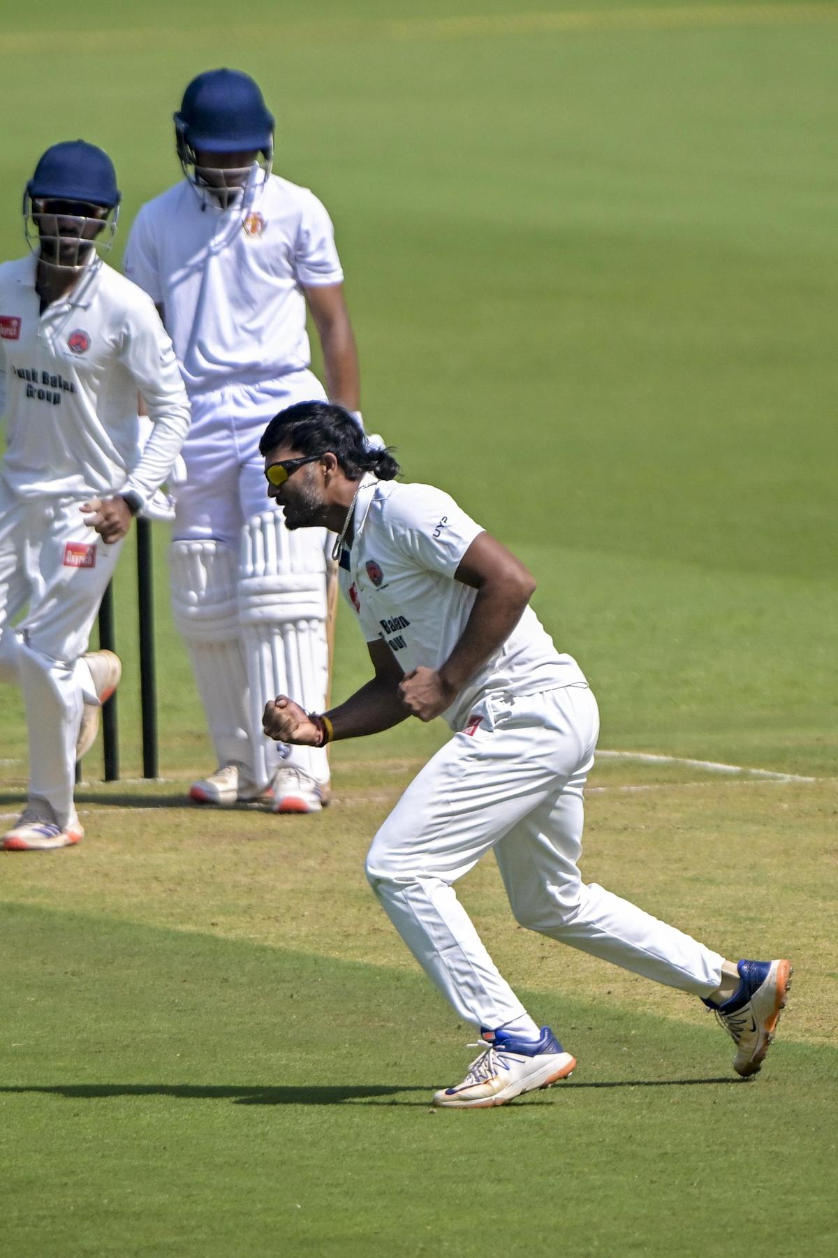 Maharashtra’s Jalaj Saxena celebrates the wicket of Karnataka’s K.V. Aneesh  on the first day of their Ranji Trophy at the MCA Stadium in Pune on Saturday, November 8, 2025.