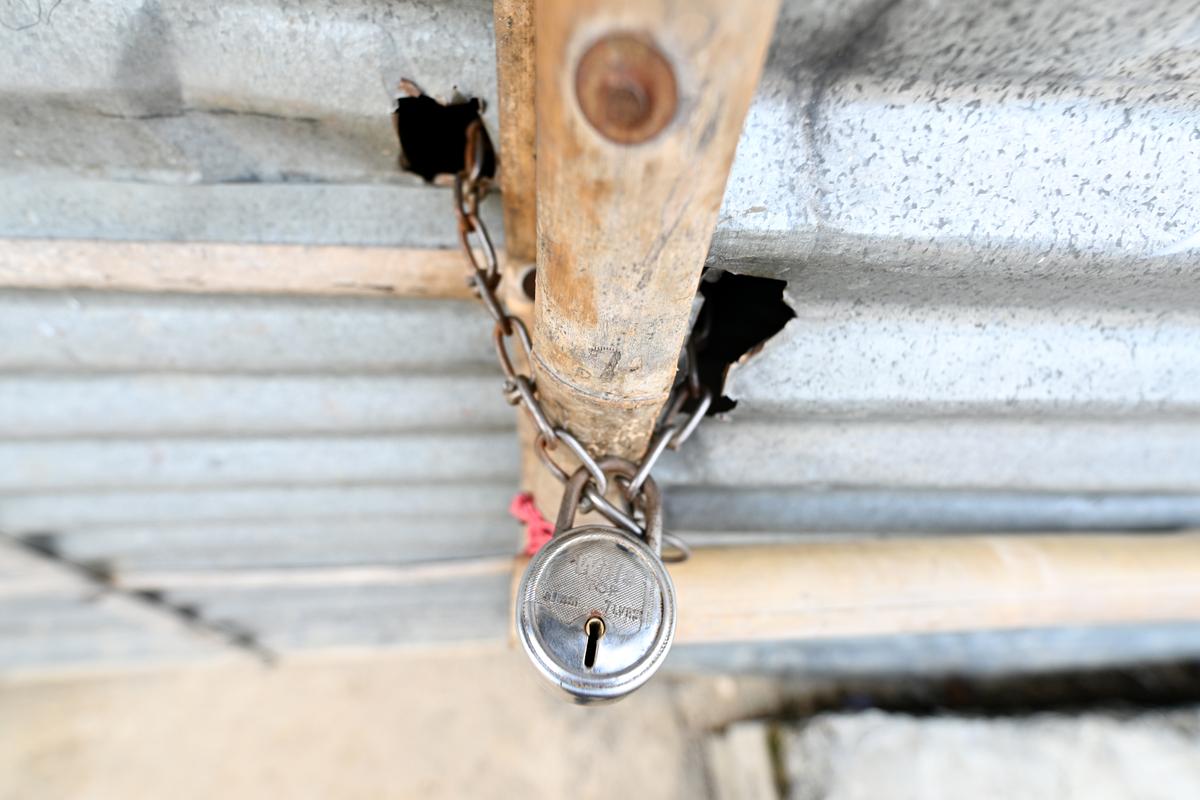 A locked house at a settlement in Gurugram belonging to a migrant worker, who returned to his home town amid the police’s verification drive.
