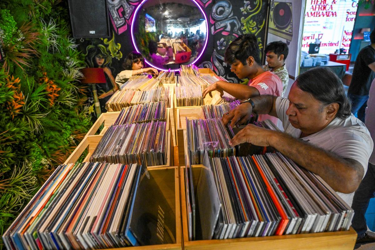 People checking out records at the Turntable Festival and Record Store Day 2024 in Khar, Mumbai