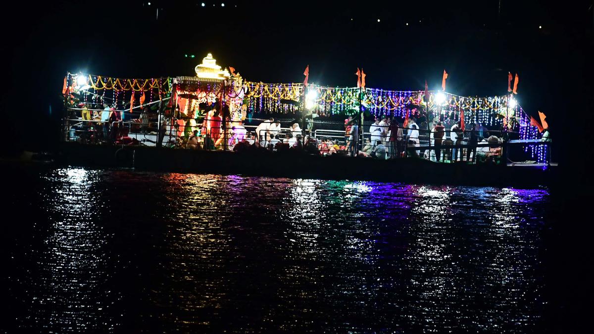 Goddess Kanaka Durga takes a boat ride in Krishna river