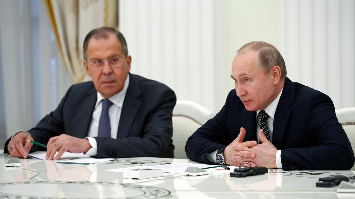 UPDATE 5-EU agrees sanctions on Putin, Lavrov as Ukraine urges tougher action