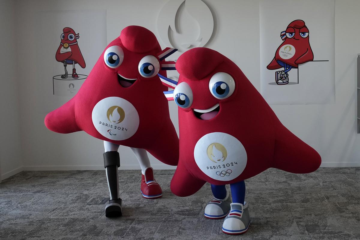 Mascots of the 2024 Paris Olympic Games, right, and Paralympics Games, a Phrygian cap, pose during a preview in Saint Denis, outside Paris