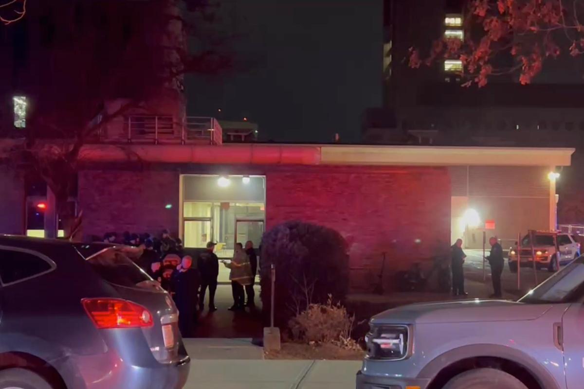 In this image from video, law enforcement officials gather outside the Brown University campus in Providence, R.I., on Saturday, Dec. 13, 2025. In this image from video, law enforcement officials gather outside the Brown University campus in Providence, R.I., on Saturday, Dec. 13, 2025.