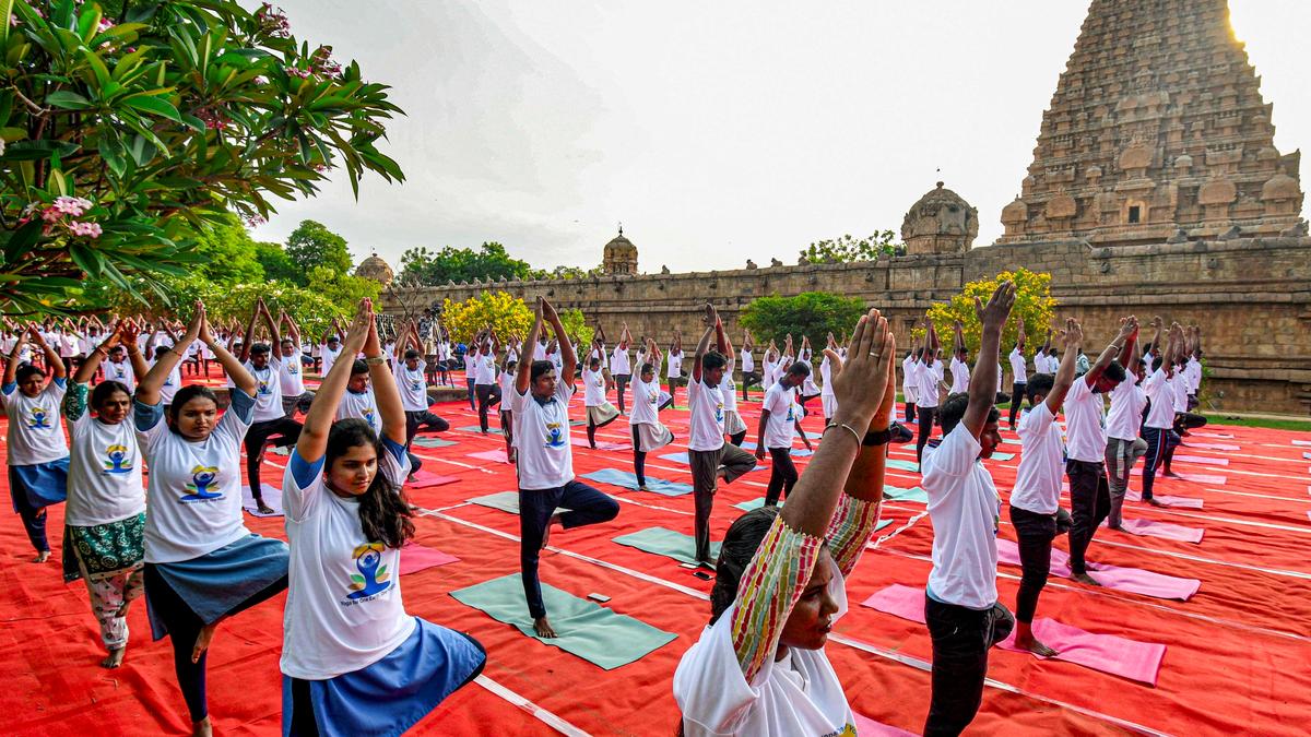Students and fitness enthusiasts turn up for International Yoga Day at Big Temple