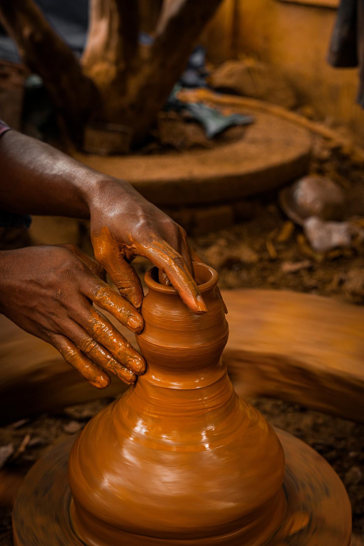 A potter working on the potter’s wheel. The picture taken by Kotni Deva Sahayam will be one of the exhibits at the photography exhibition in Andhra University in Visakhapatnam.