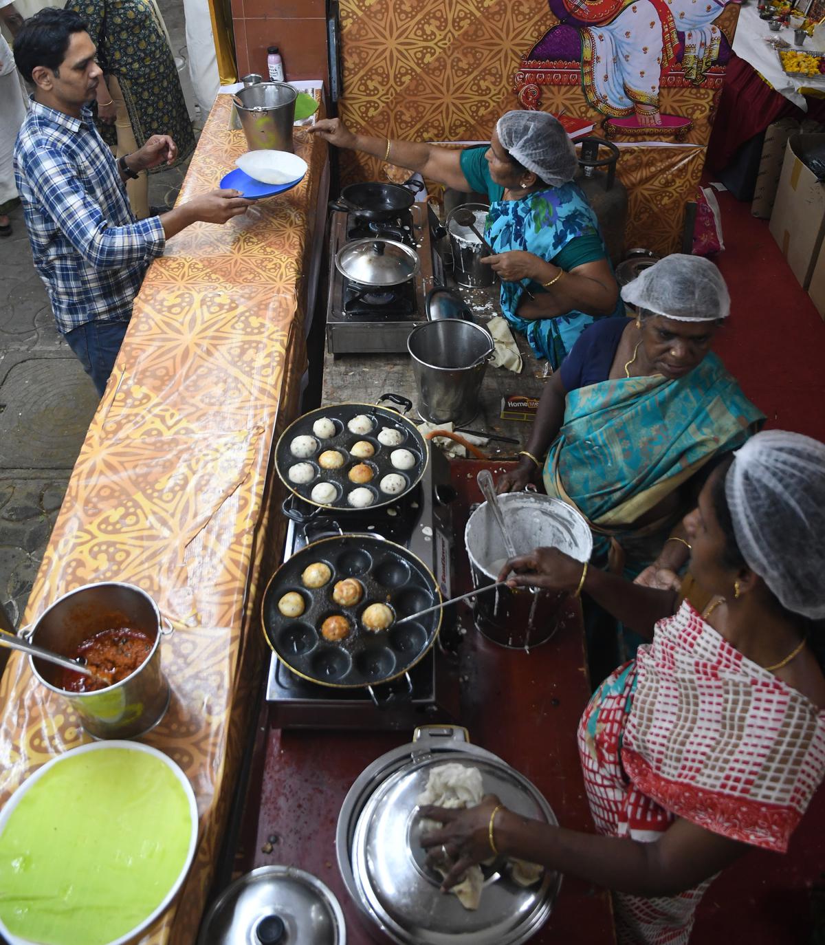 Kuzhi paniyaram live counter at Narada Gana Sabha’s canteen by Sri Saasthalaya catering services