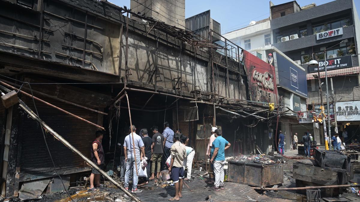 Chandni Chowk fire: Delhi Fire Services personnel continue cooling operations 