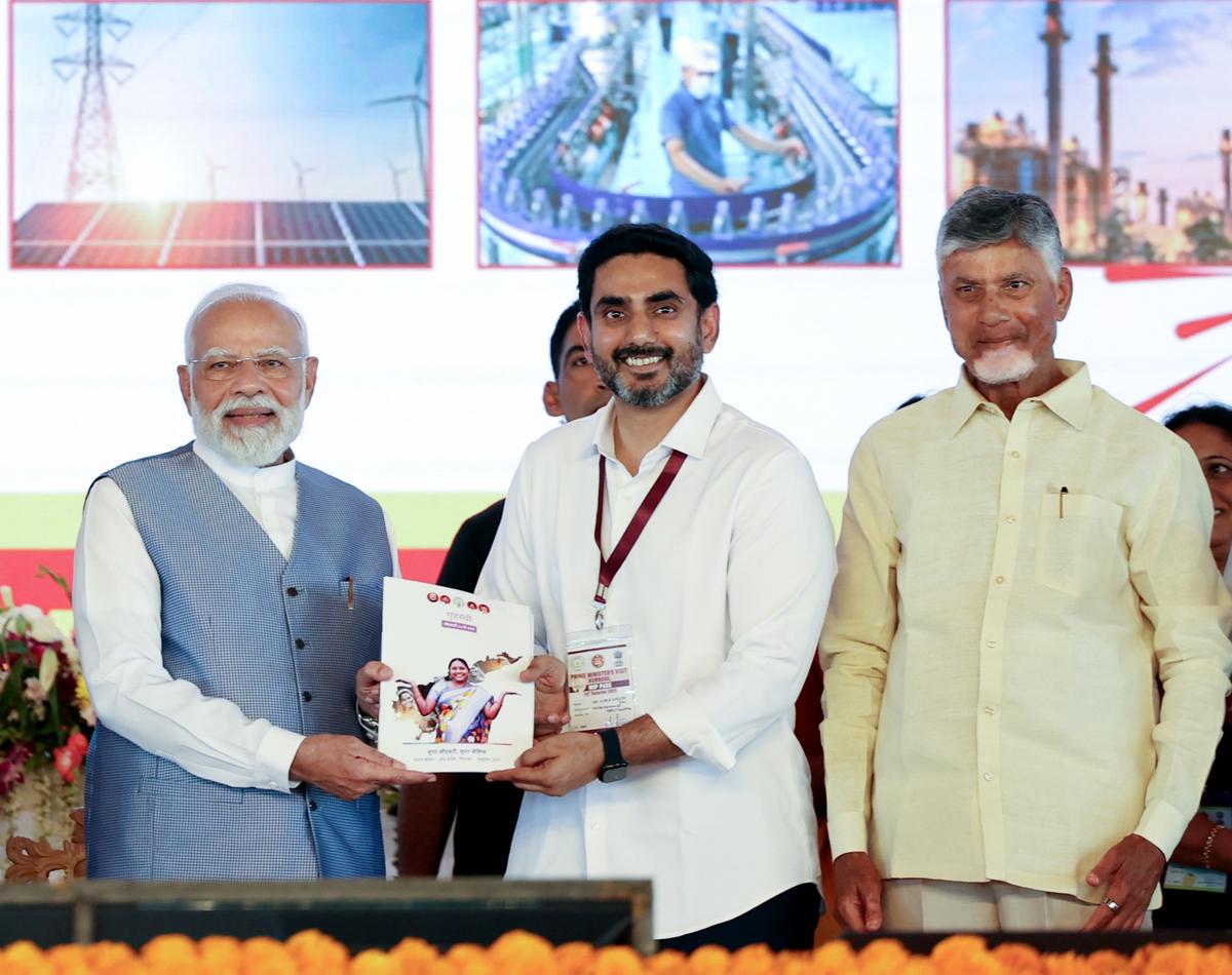 Prime Minister Narendra Modi with Minister for IT Nara Lokesh and Chief Minister N. Chandrababu Naidu in Kurnool on Thursday.