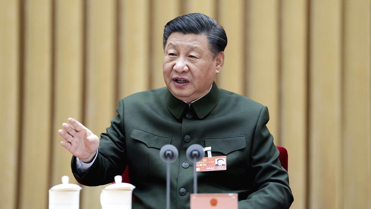 China's Xi Jinping calls for 'more quickly elevating' armed forces