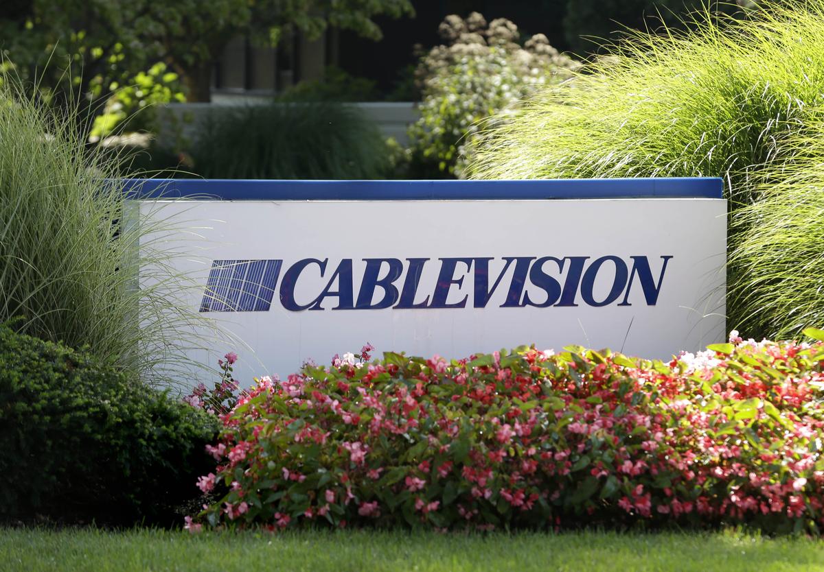 FILE - A sign is displayed at Cablevision headquarters in Bethpage, N.Y., on Sept. 17, 2015. 