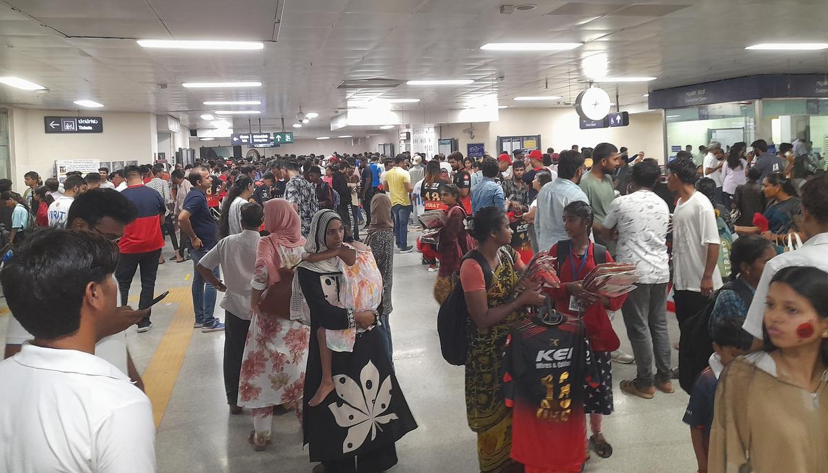 The crowded Cubbon Park metro station during the rain on Saturday evening. Many people who had come for the IPL match were stuck at the station because of the heavy rain.  