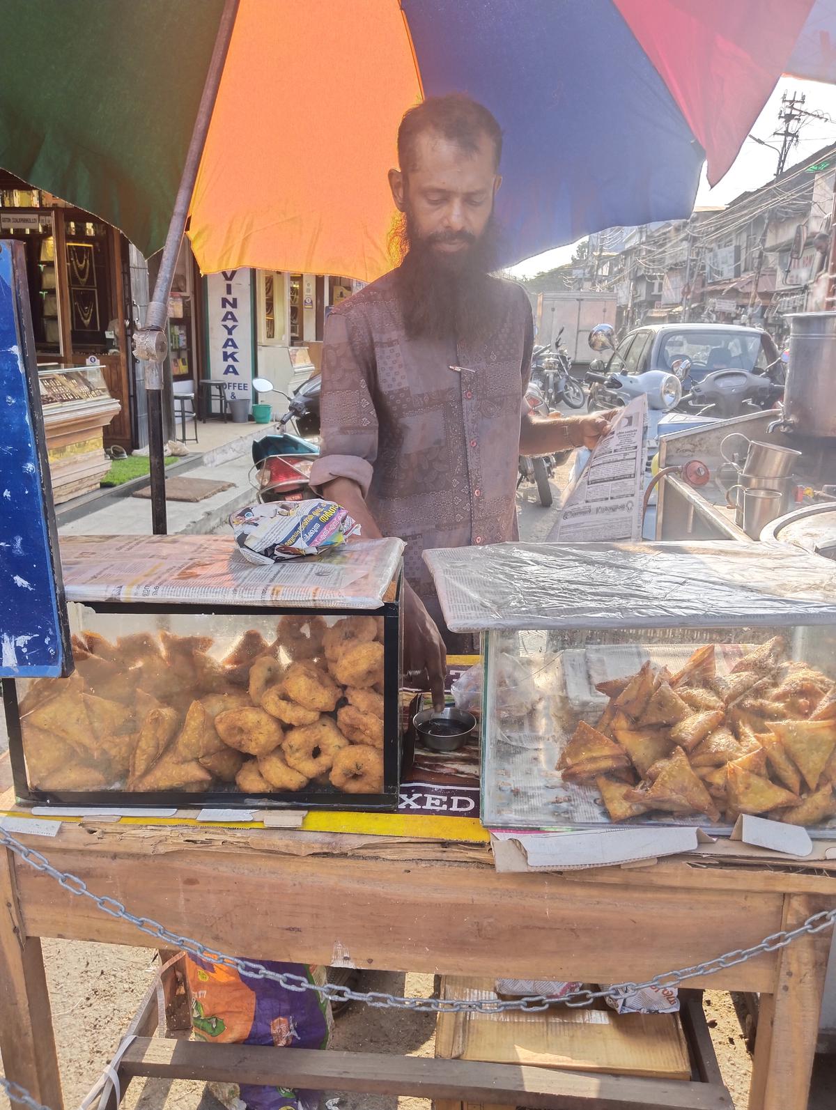 Sale of snacks in front of the mosque inside Chala market