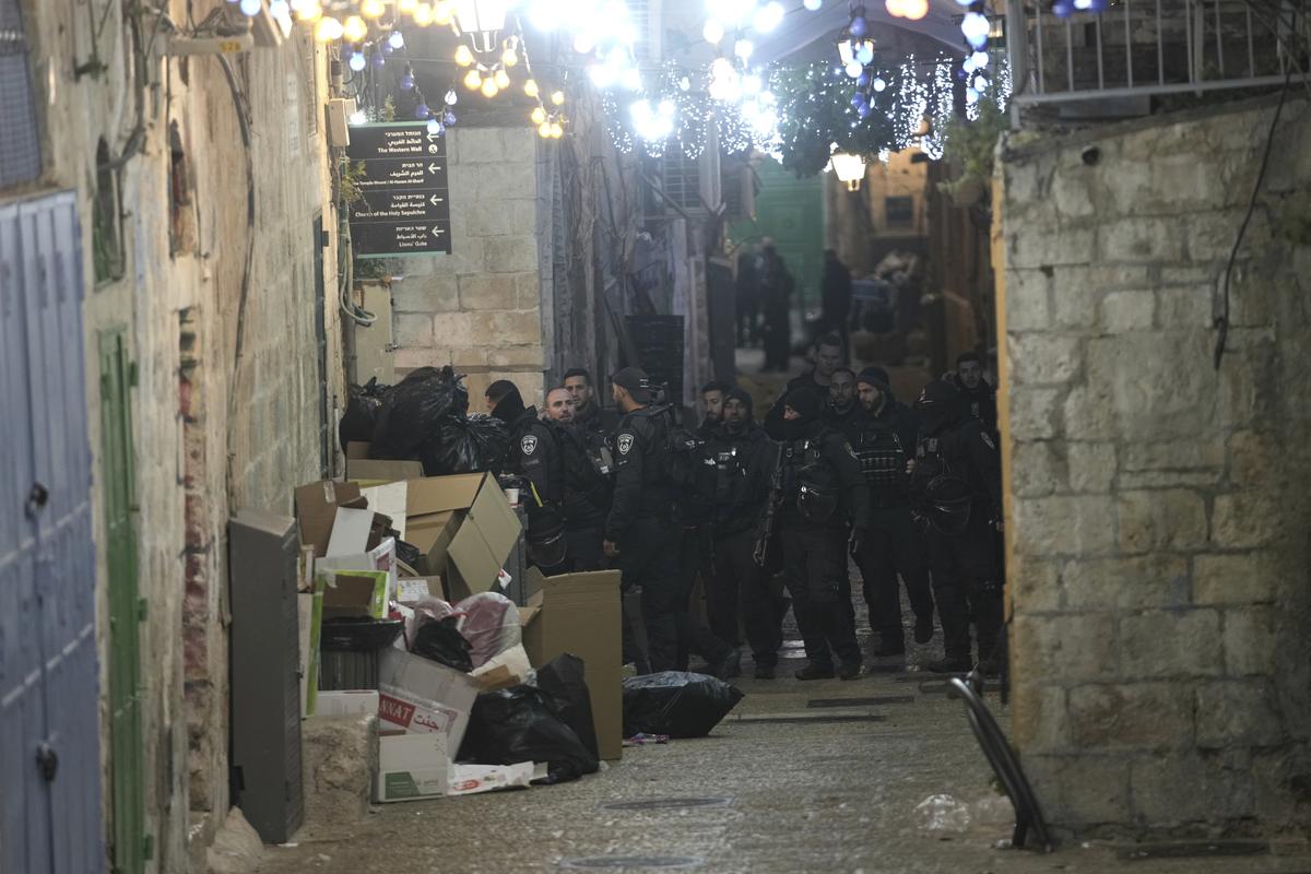Israeli police are deployed near the Al-Aqsa Mosque compound after shots were fired in the Old City of Jerusalem during the Muslim holy month of Ramadan, Saturday, April 1, 2023. Israeli police are deployed near the Al-Aqsa Mosque compound after shots were fired in the Old City of Jerusalem during the Muslim holy month of Ramadan, Saturday, April 1, 2023.