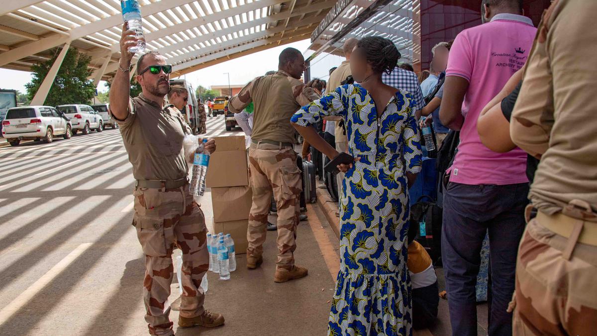 Foreign nationals evacuate Niger as regional tensions rise after coup