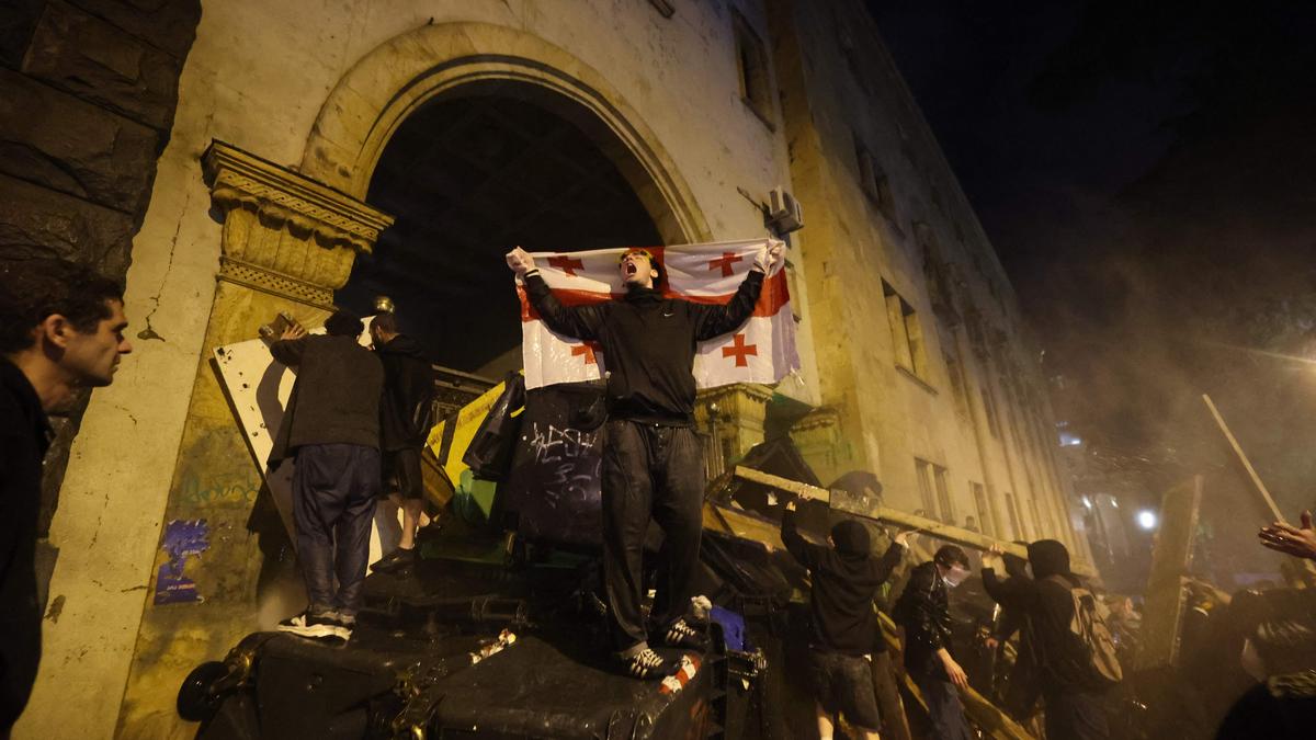 Police in Georgia’s capital break up a tent camp set up by protesters demanding a new election thumbnail