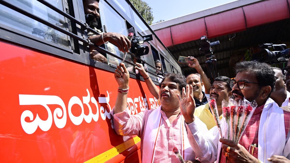 BJP gifts roses  to male RTC bus passengers to protest against fare hike