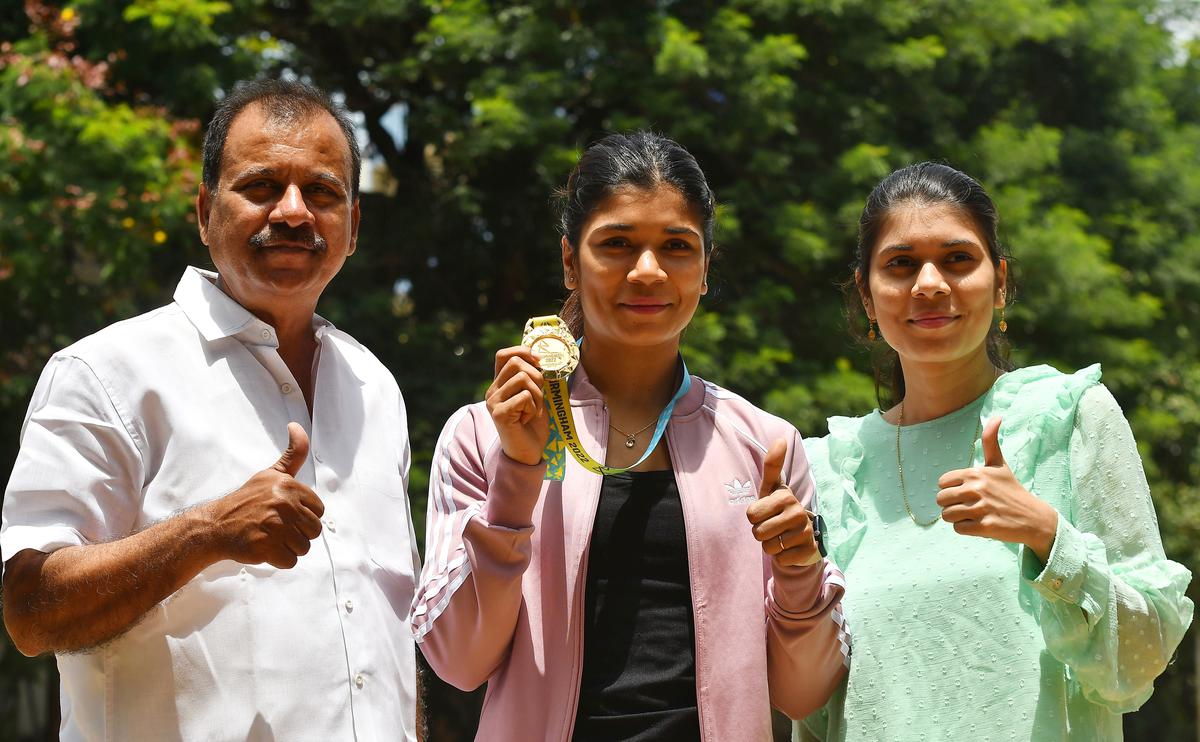 World champion Nikhat Zareen, who clinched the women’s 50kg light flyweight gold at the Commonwealth Games 2022 in Birmingham, poses with her father Jameel and sister Dr. Anjum in Hyderabad on Wednesday, August 17, 2022. 