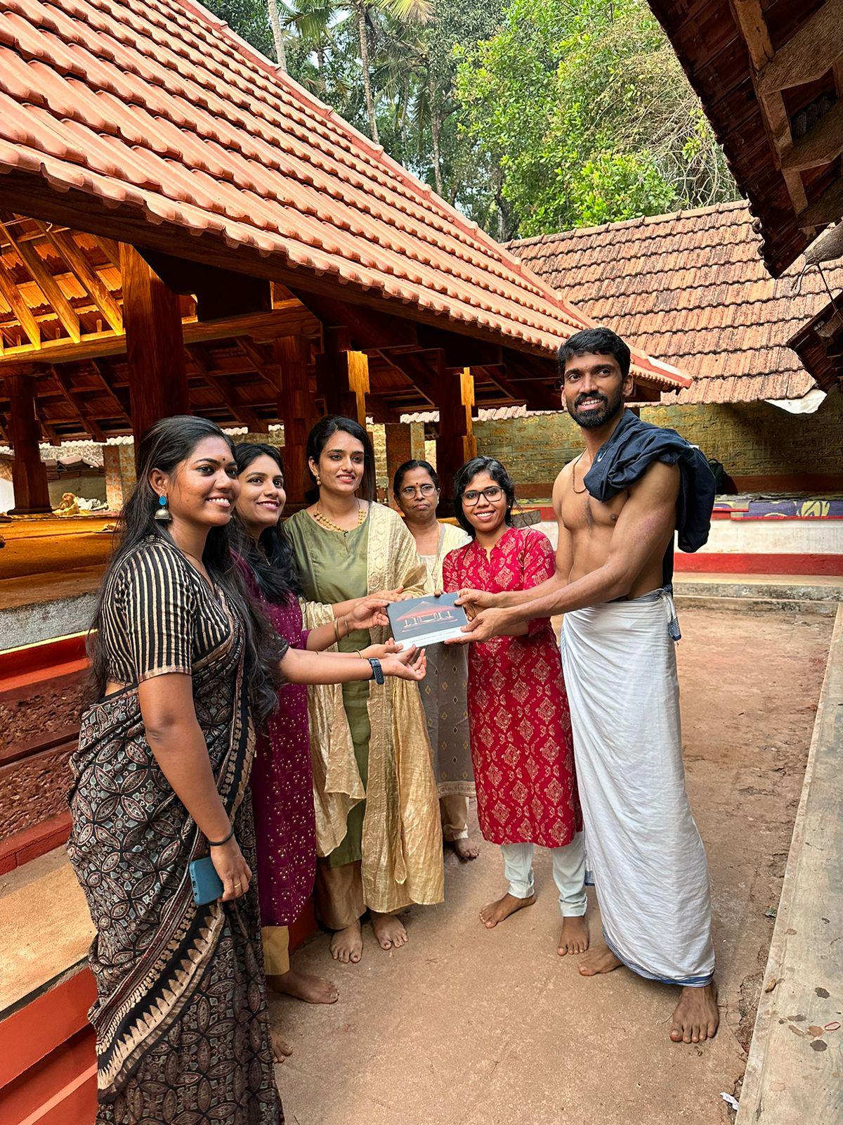 Shruthin Lal with the architects during a function in connection with the restoration of the Mandapam of Kunnamangalam Bhagawati Temple in Naduvannur.