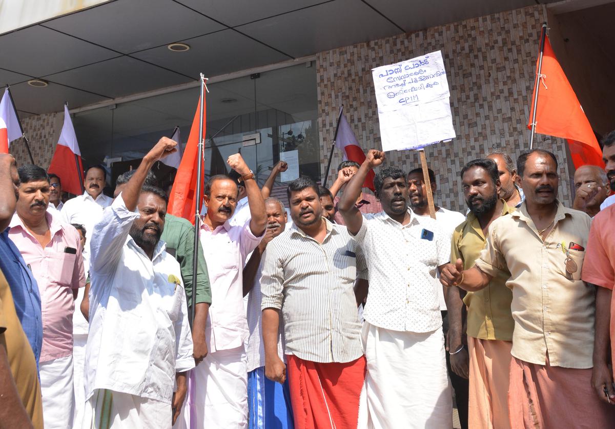 CPI(M) workers on Thursday staging a dharna demanding action to resume operations of the passport Seva Kendra in Kottayam
