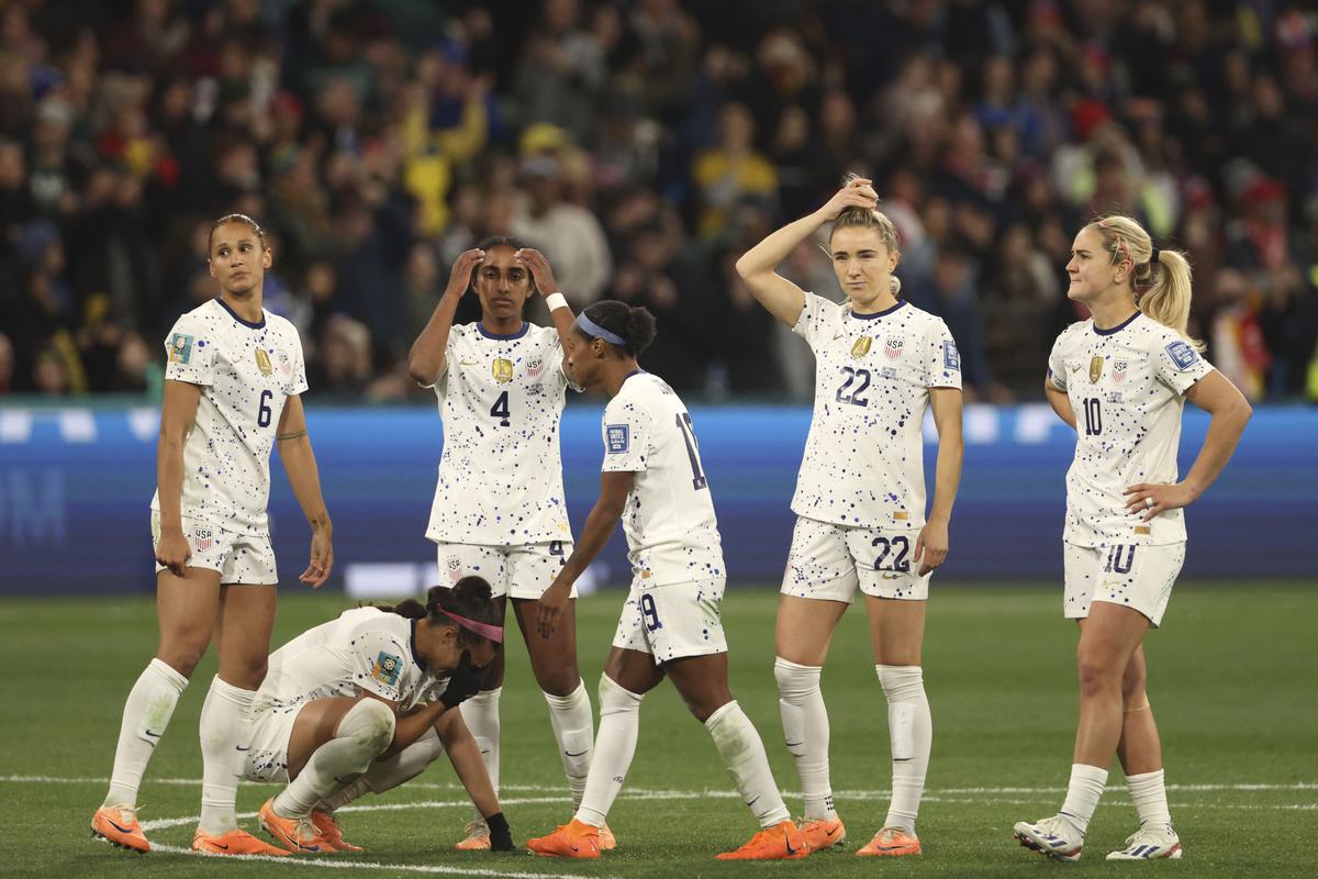 United States’ players react after losing their Women’s World Cup round of 16 soccer match against Sweden in Melbourne on August 6, 2023. 