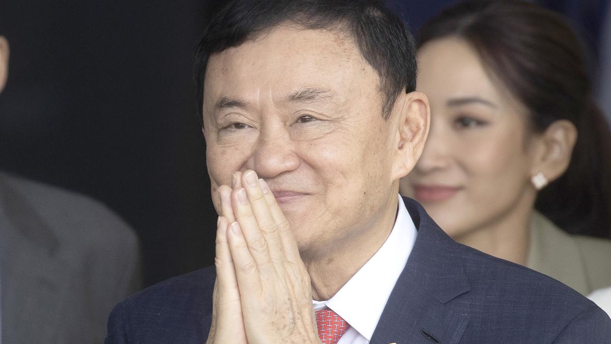 Thai king cuts ex-PM Thaksin's jail term to one year