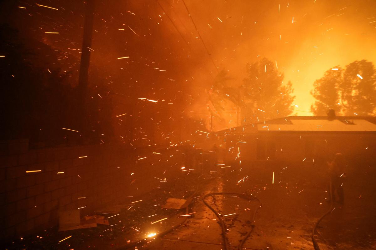 Sparks fly as the Eaton Fire burns in Pasadena, California, U.S. on January 7, 2025. 